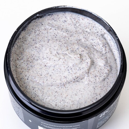 A close up view of the Fine face scrub, with many small exfoliating particles made from natural ingredients.