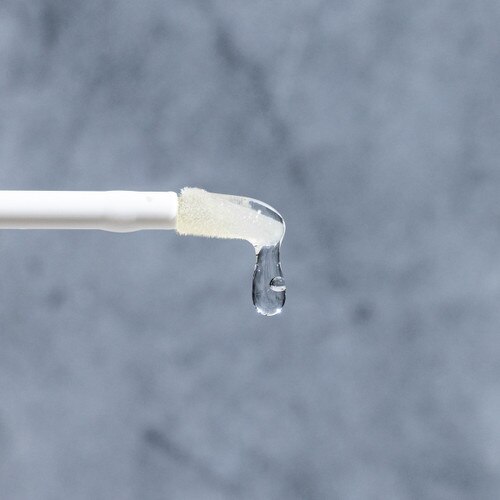 A closeup of the plush non-stick formula of lip drip by kandi koated on the applicator