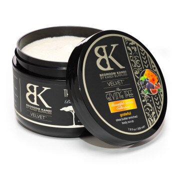 An open jar of Velvet body scrub in Grateful